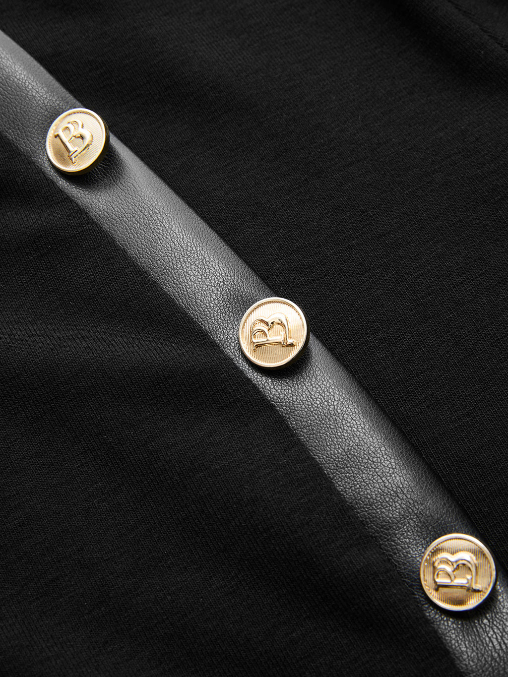 Asymmetrical Knit Top with Faux Leather Accents