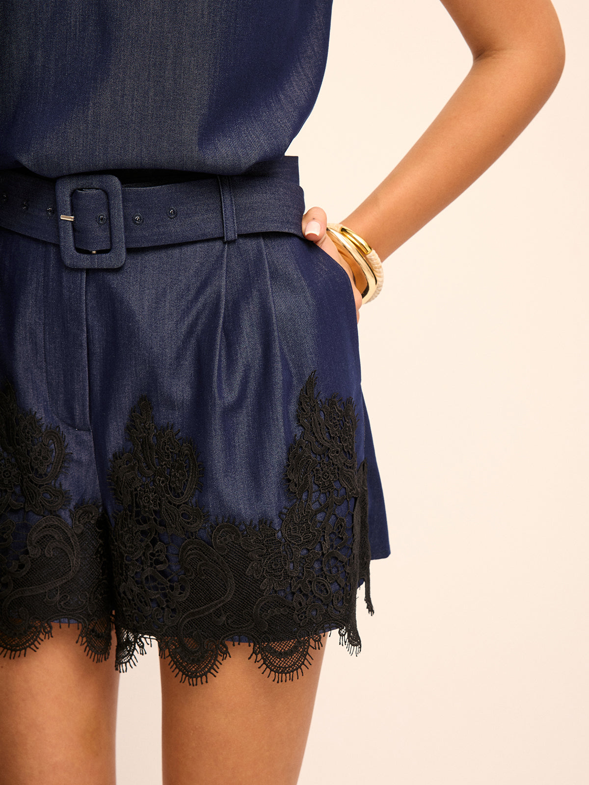 Chic Sleeveless Polo Top with Lace-Hem Shorts Ensemble