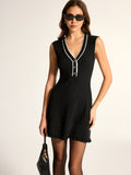 Ribbed Knit Dress with Contrast Trim and Ruffled Hem