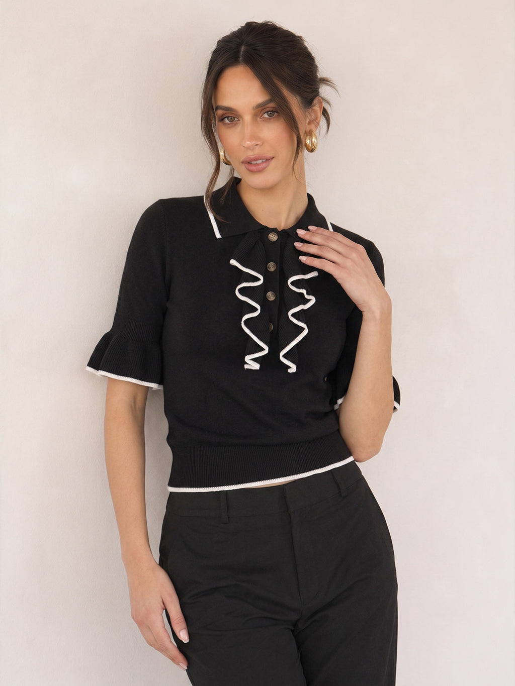 Ruffled Knit Top with Contrast Trim Details